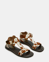 BRAZINN Brown Cow Print Strappy Flat Sandal Women's Sandal | Steve Madden US