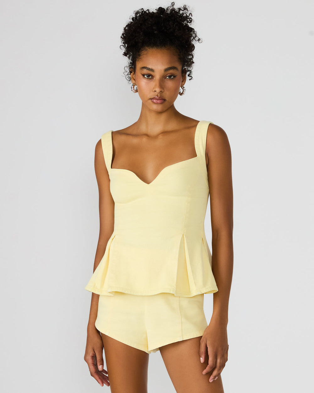 ZENIA Golden Glow Sleeveless Peplum Women's Top | Steve Madden for Sale