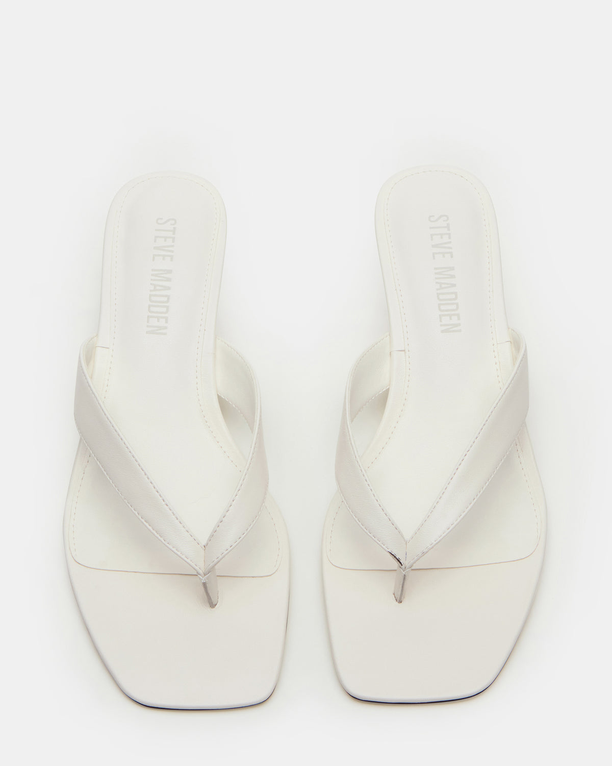 TRACIE White Leather Thong Strap Women's Kitten Heel | Steve Madden US