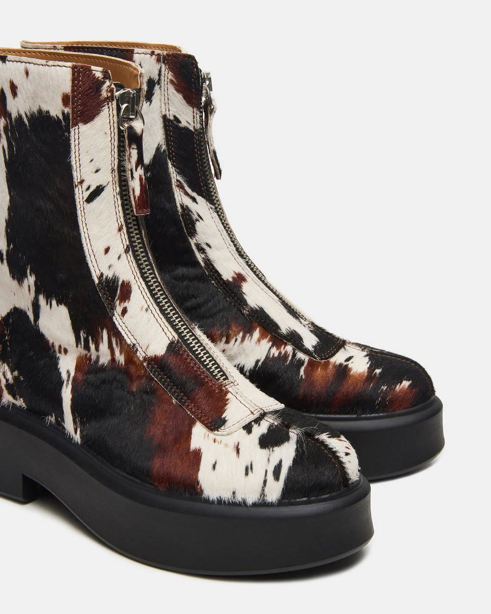 JONES Brown Cow Print Zipper Lug Women's Ankle Boot | Steve Madden Sale