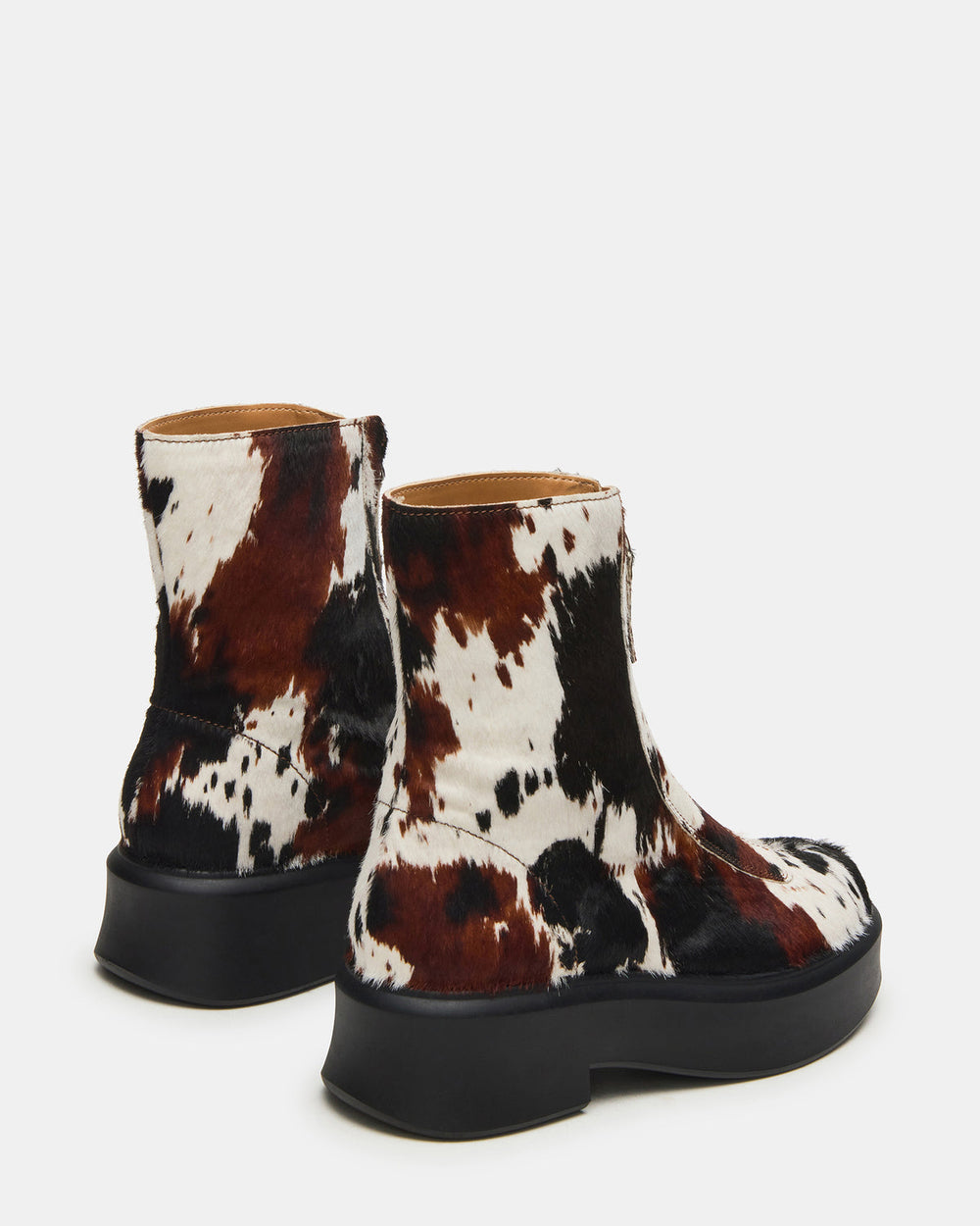 JONES Brown Cow Print Zipper Lug Women's Ankle Boot | Steve Madden Sale