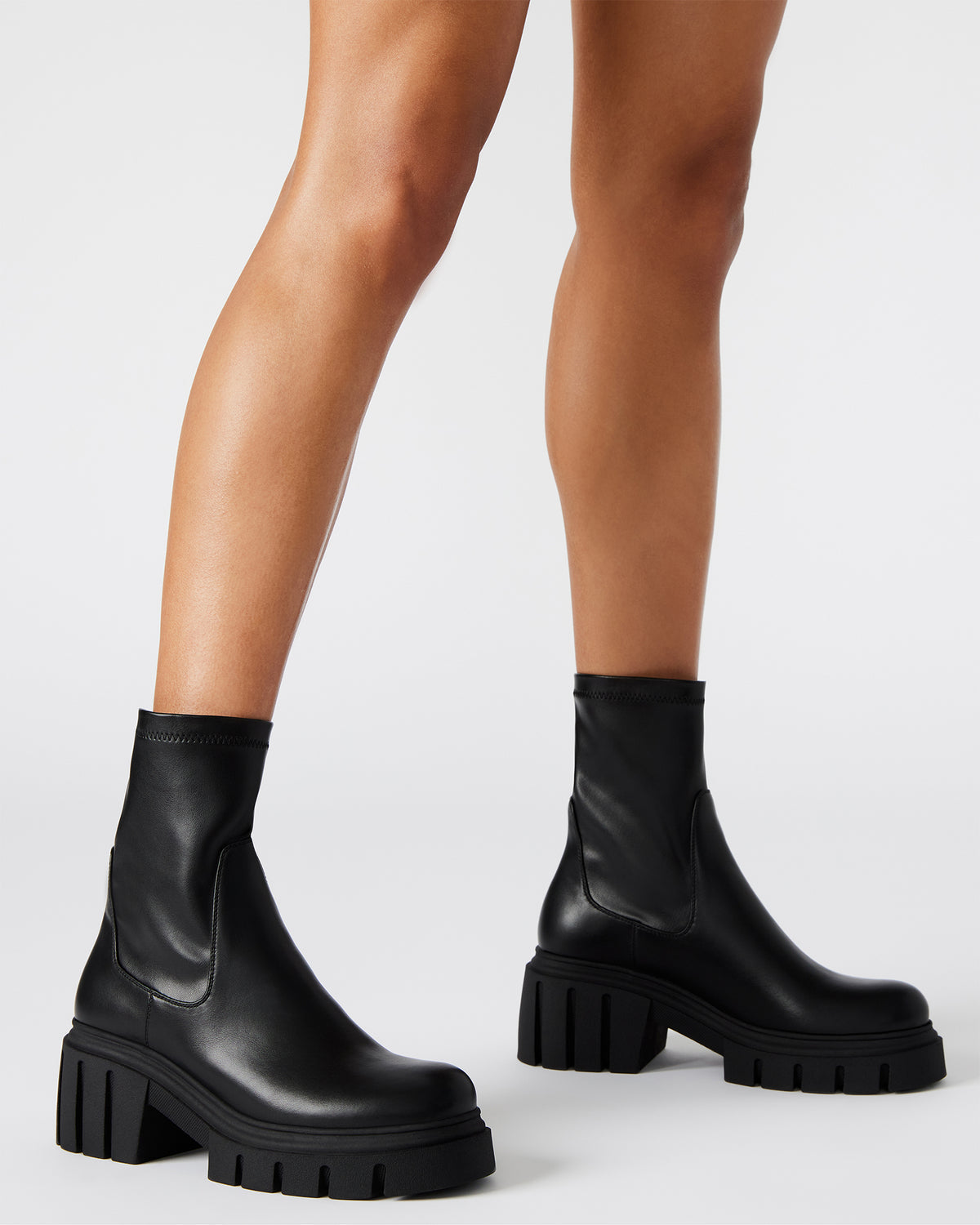 BOOMBA Black Lug Sole Ankle Boot | Women's Booties | Steve Madden Sale
