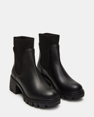 HUTCHH20 Black Water-Resistant Lug Sole Ankle Boot | Women's Booties | Steve Madden on Sale