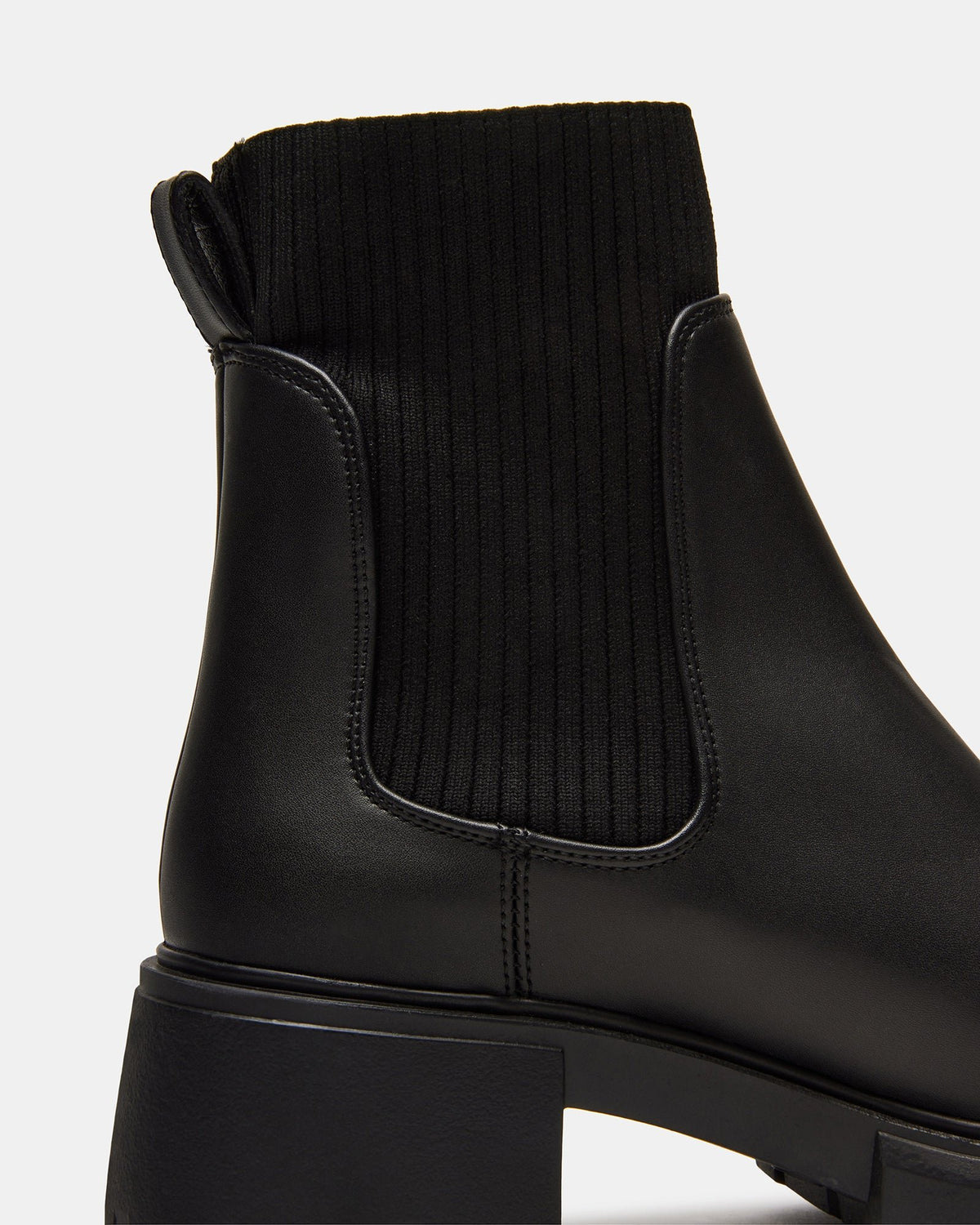 HUTCHH20 Black Water-Resistant Lug Sole Ankle Boot | Women's Booties | Steve Madden on Sale