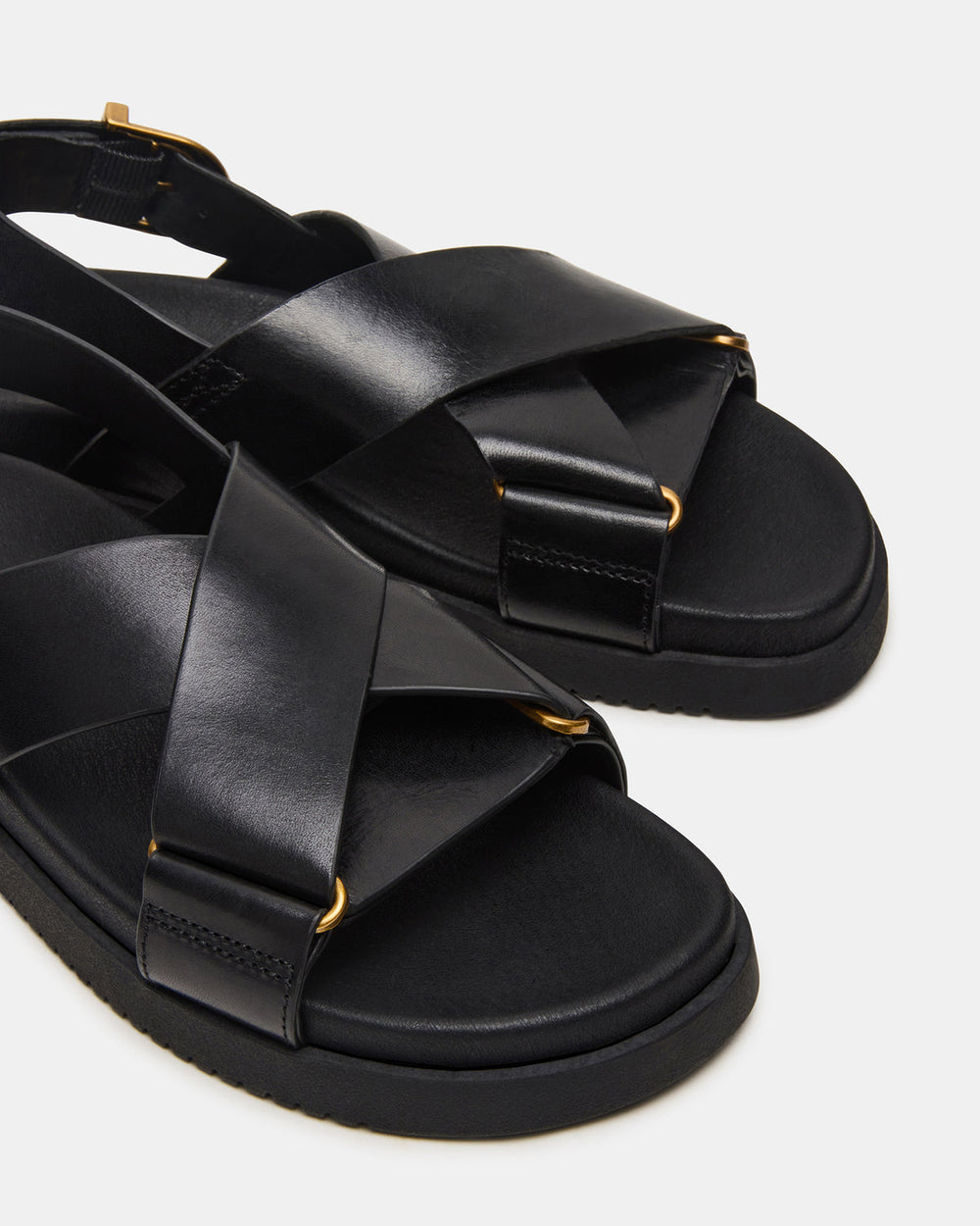 DONELLI Black Leather Strappy Footbed Women's Sandal | Steve Madden on Sale
