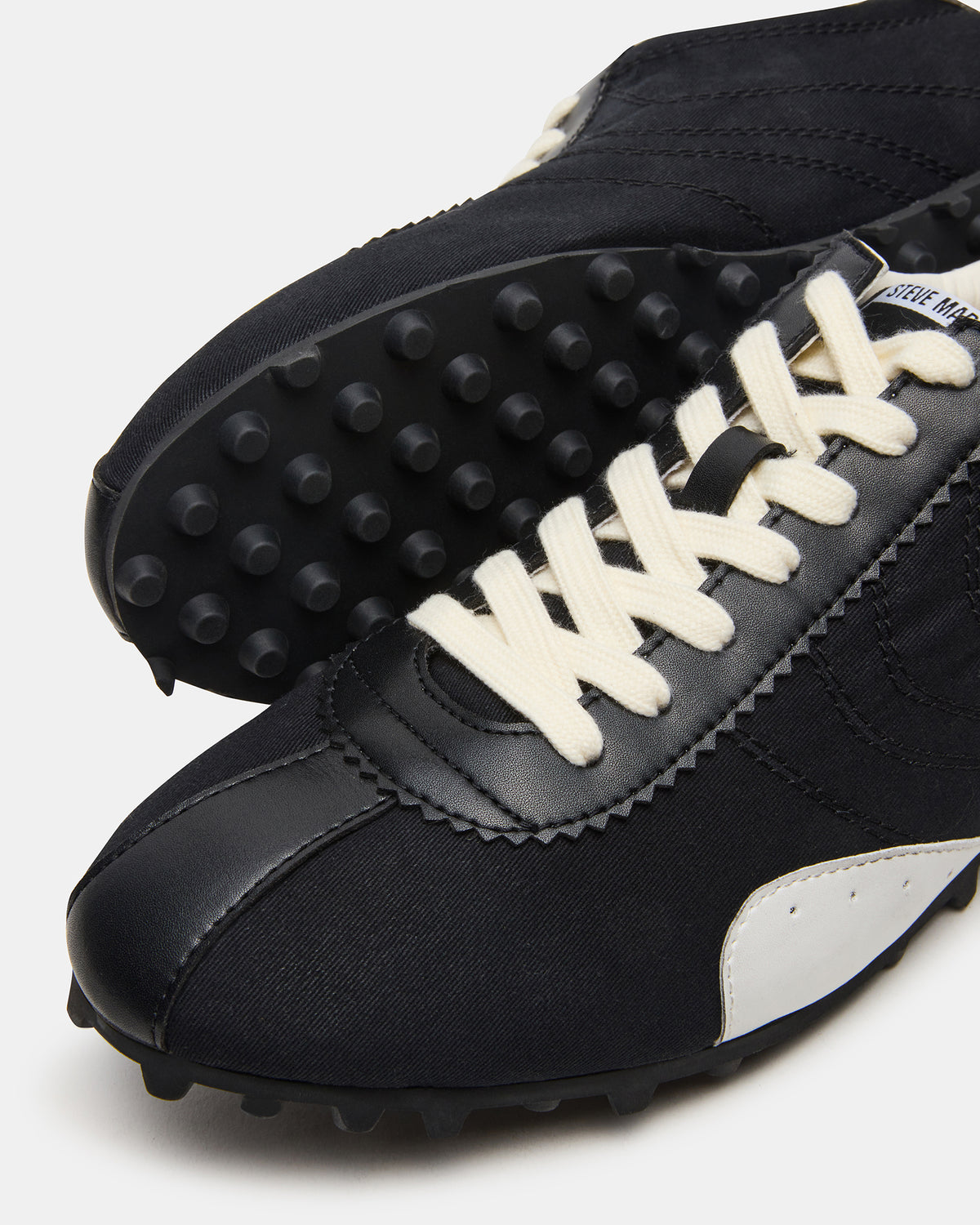 PUZZLE Black Low-Top Lace-Up Men's Sneaker | Steve Madden on Sale