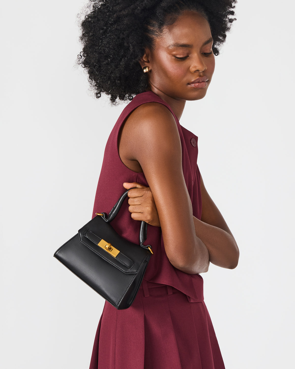 MADLYN Bag Black Structured Turn-Lock Closure Top-Handle Crossbody Mini Handbag | Steve Madden for Sale