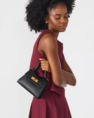 MADLYN Bag Black Structured Turn-Lock Closure Top-Handle Crossbody Mini Handbag | Steve Madden for Sale