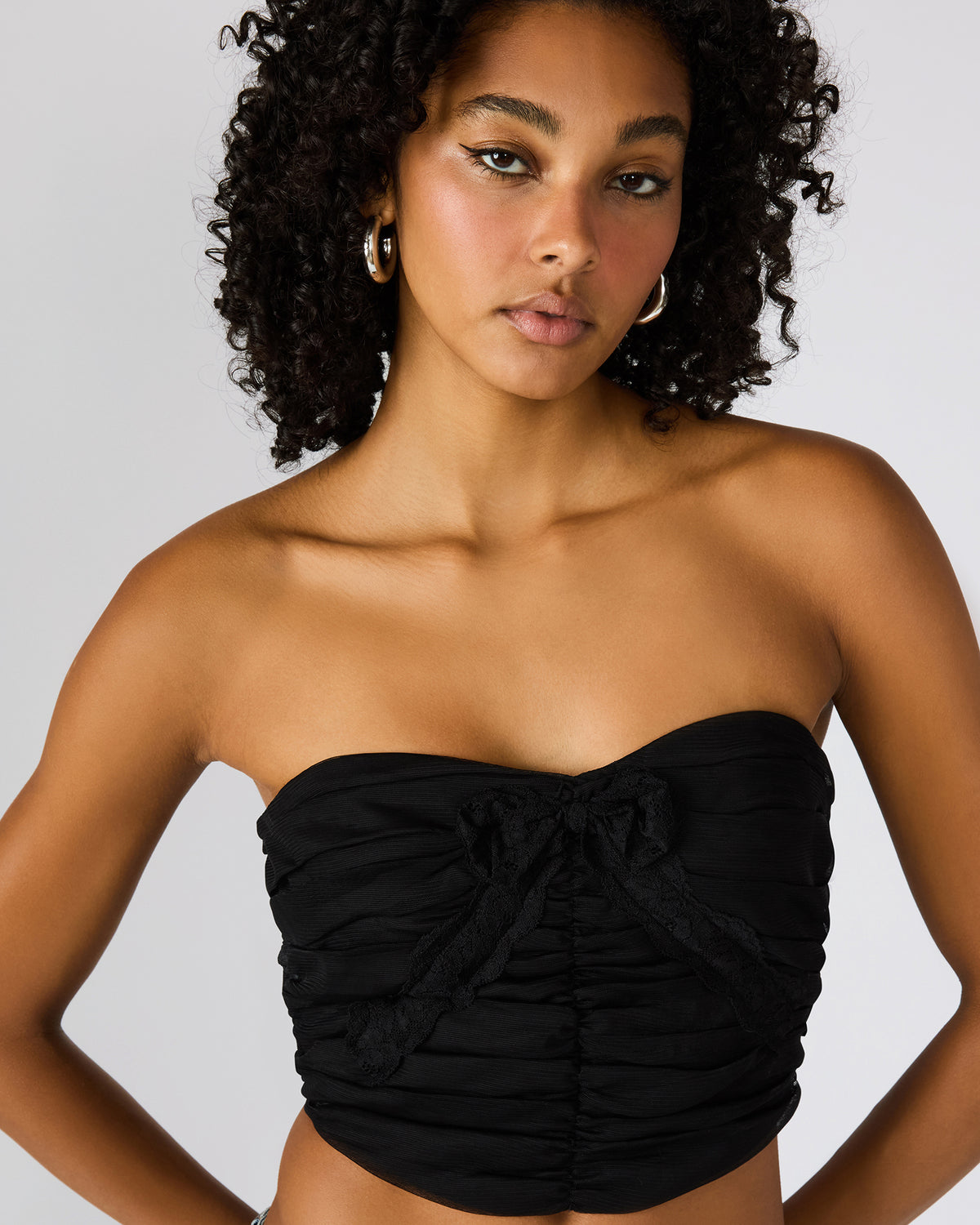 MARTINE Black Strapless Ruched Cropped Corset Women's Top | Steve Madden near me